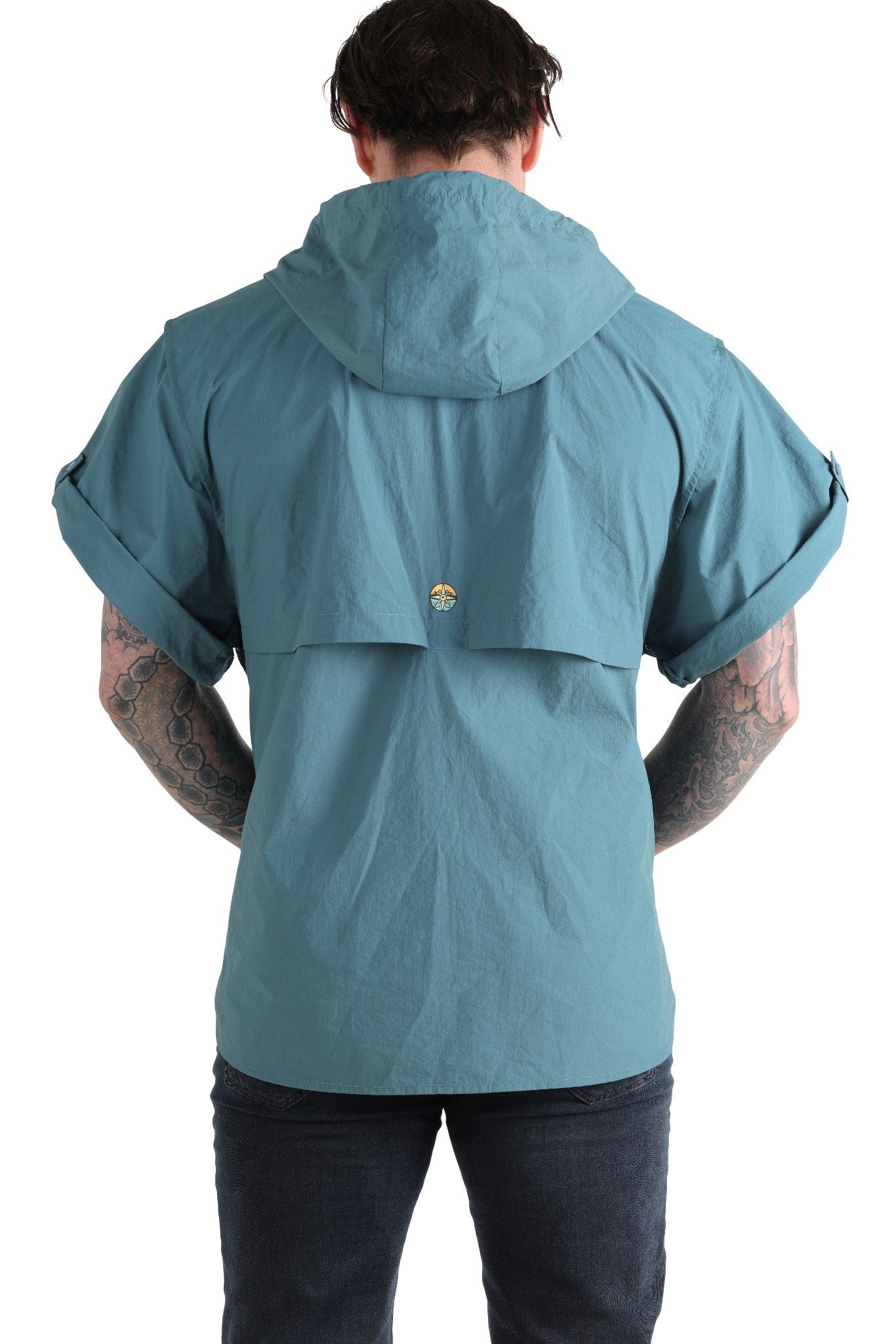 Person wearing a light blue jacket with a hood on a white background